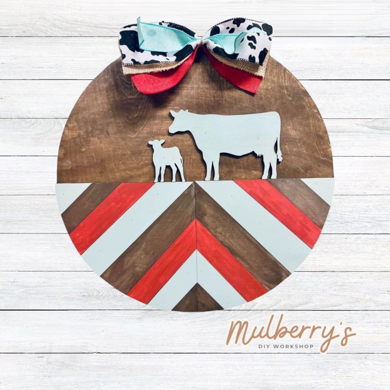 Our 18-inch barn quilt door hanger with cows is moo-tastic for cow lovers or those who have their own homestead.