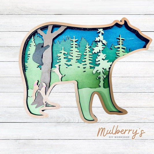 Our multilayered projects are so much fun to paint. This 6-layered project features a bear in a tree with dogs in the woods. It's approximately 9 inches tall by 11 inches wide.