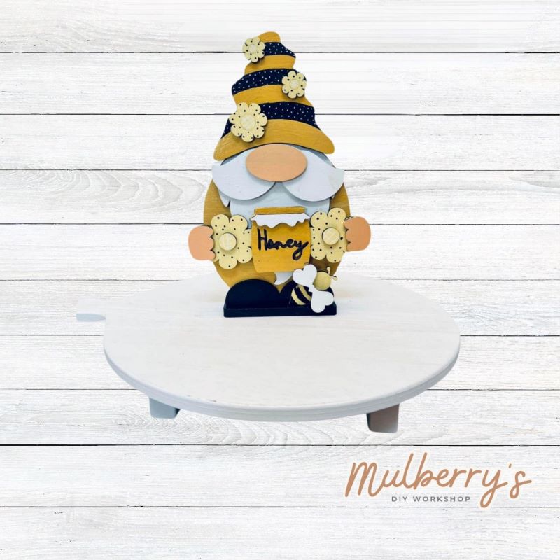 Our cute little honey bee gnome is approximately 7.5" tall by 5.5" wide.