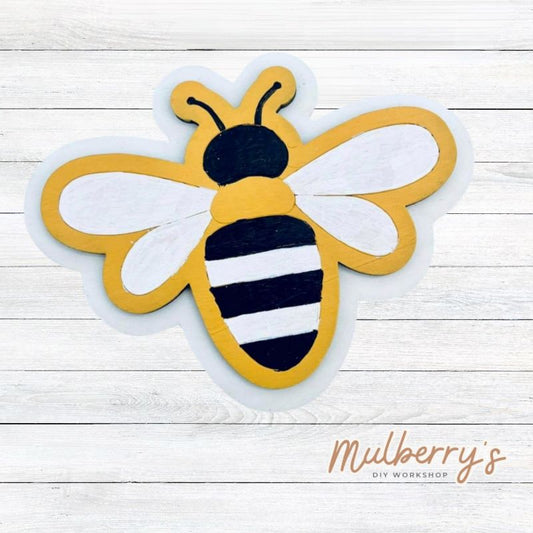 Our bee magnet is hive-tastic! Approximately 4" tall by 4" wide.