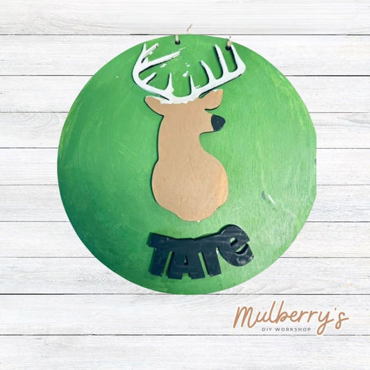 Our mini 9.5" door hanger with a deer and is a popular project for kids! This design can be personalized with a name in either print or cursive.
