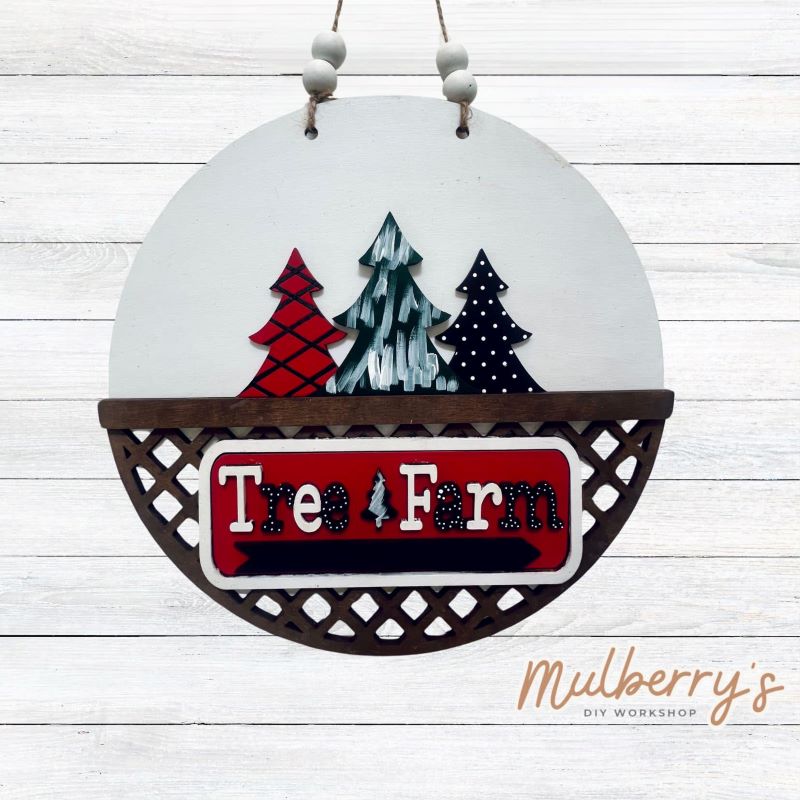 Welcome family and friends with our interchangeable lattice round door hanger! Simply swap out inserts to match the different holidays and seasons! It's approximately 10.5" in diameter.  Includes: Lattice Round Door Hanger with Christmas Tree Inserts. Additional inserts are available to purchase.