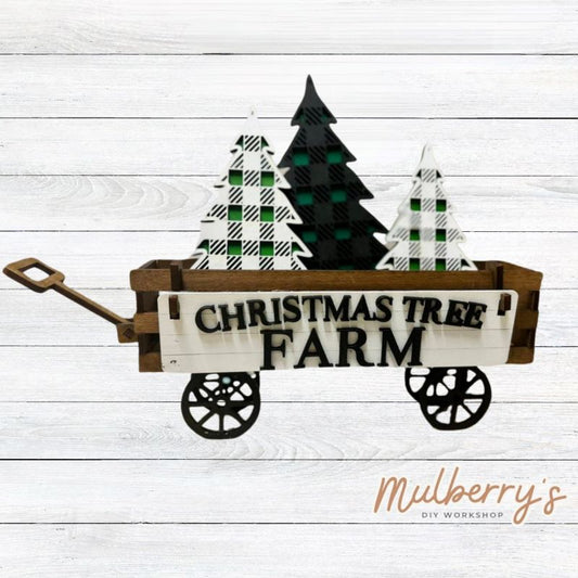 It doesn't get any cuter than our little rustic wagon! It's a perfect add on accessory to your décor. It's approximately 4" tall x 12" wide.  Includes: Wagon and Christmas Tree Inserts.  Christmas Tree inserts include three trees and the Christmas Tree Farm banner.