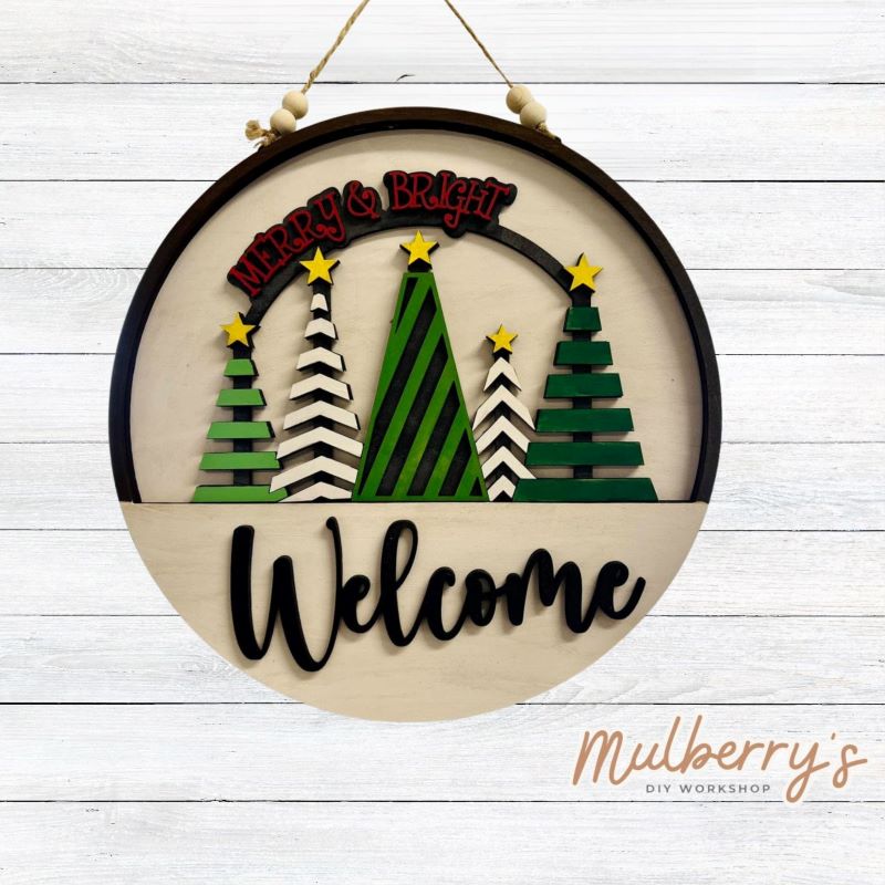 Welcome family and friends with our interchangeable welcome door hanger! Simply swap out inserts to match the different holidays and seasons! It's approximately 10.5" in diameter.  Includes: Welcome Door Hanger with Merry & Bright Insert. Additional inserts are available to purchase.