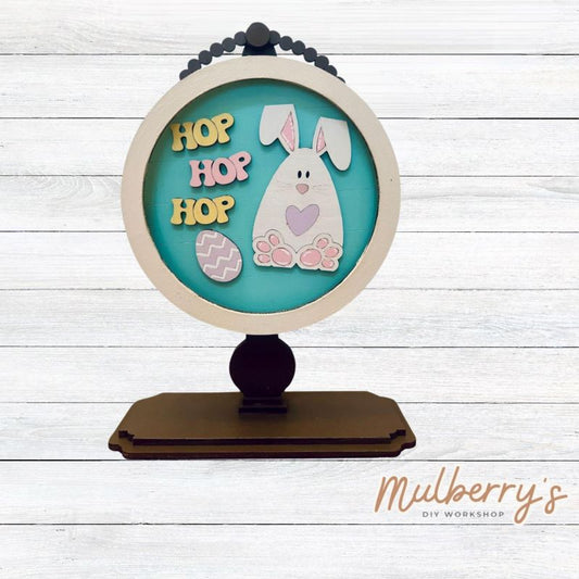 We love our interchangeable tabletop! It's approximately 10" tall and can display your favorite seasonal/holiday insert. This set includes the interchangeable tabletop and the Easter insert.