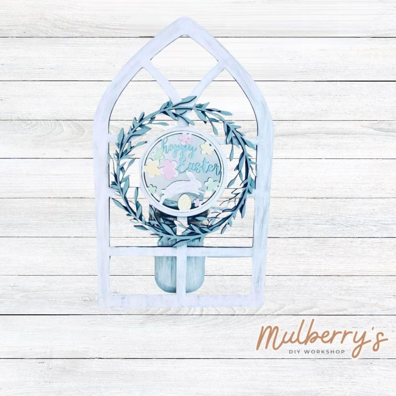 We love our interchangeable window! It's approximately 16" tall by 10" wide and can display your favorite seasonal/holiday insert. This set includes the interchangeable window and easter insert.