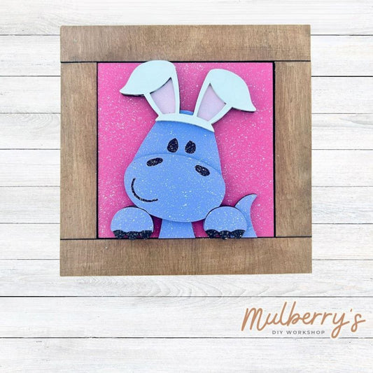 Our interchangeable square frame is the perfect way to display the different seasonal and holiday decorative tiles! Choose your favorite winter decorative tile to display inside! This listing includes the base and choice of one Easter dino insert. Approximately 6" in diameter.