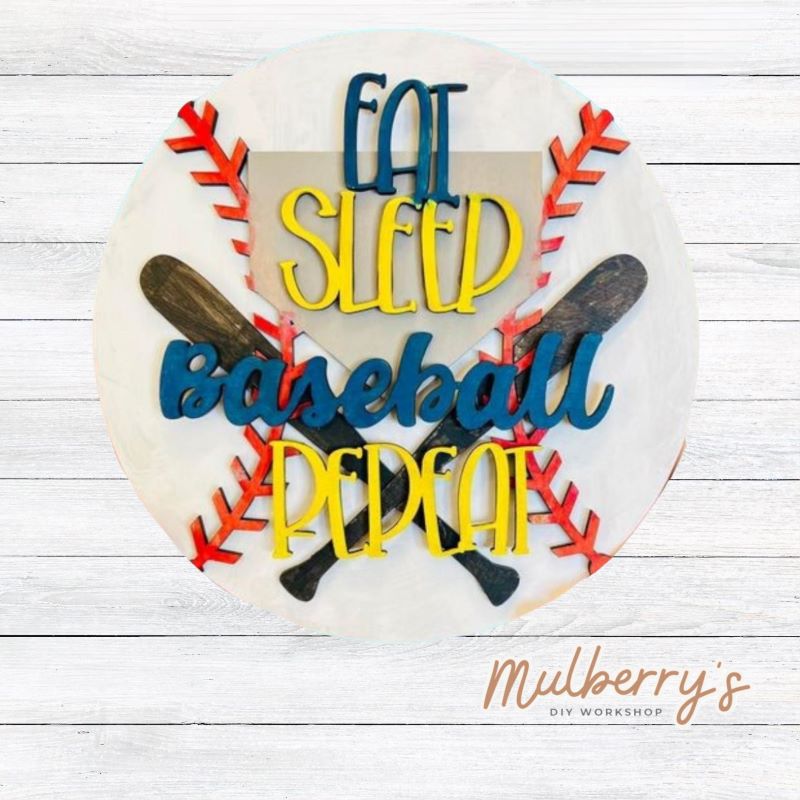 Eat, sleep, baseball, repeat, sounds like a good life! This mini door hanger is 10.5" in diameter.