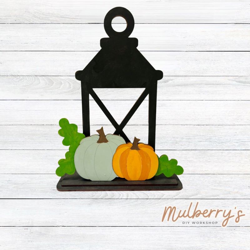 We love our interchangeable lantern! It's approximately 11" tall and can display your favorite seasonal/holiday insert. This set includes the interchangeable lantern and the fall insert.