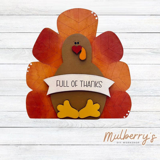 Decorate your home this Thanksgiving with our Full of Thanks Turkey shelf sitter! He's super cute and measures at approximately 6" tall. Includes a small kickstand to sit up.