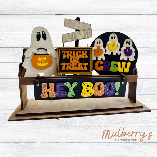 It doesn't get any cuter than our little rustic crate! It's a perfect add on accessory to your décor. It's approximately 13" long. Includes: Crate and Ghost Inserts. Ghost inserts include ghost, directional sign, boo crew round, and the Hey Boo! banner.