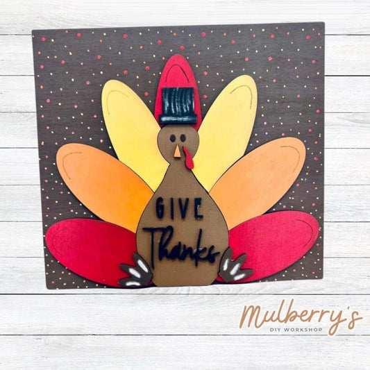 Our cute give thanks turkey sign is the perfect size for your kids to complete! Approximately 10" tall by 9.5" wide. Optional stand is available.