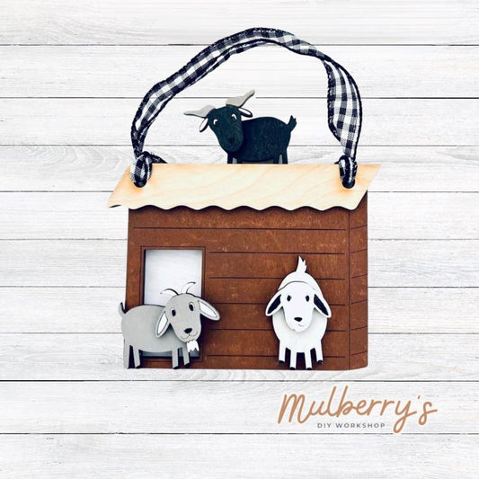 Display our oversized goat house ornament on your Christmas tree or in your home! Approximately 6" tall.