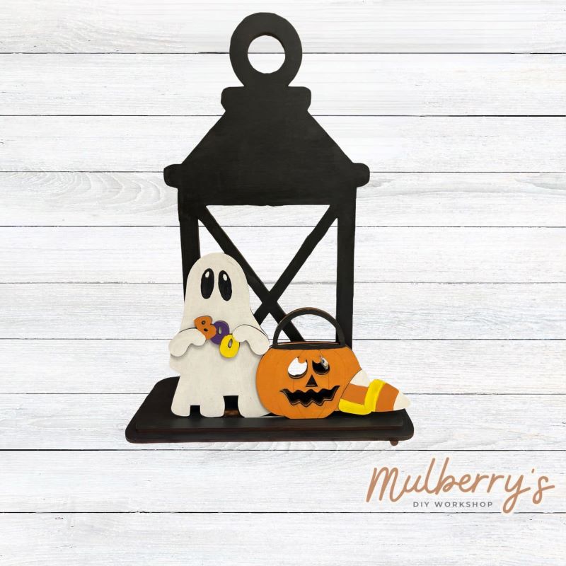 We love our interchangeable lantern! It's approximately 11" tall and can display your favorite seasonal/holiday insert. This set includes the interchangeable lantern and the halloween insert.