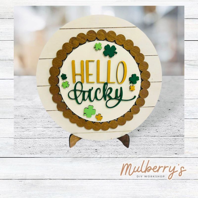 We love our large interchangeable plate with stand! It's approximately 11.5-inches is diameter and can display your favorite seasonal/holiday insert. This set includes the large interchangeable plate with stand and the hello lucky insert.