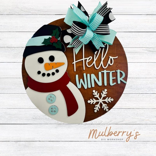 Welcome winter with our 18" Hello Winter with Snowman doot hanger.