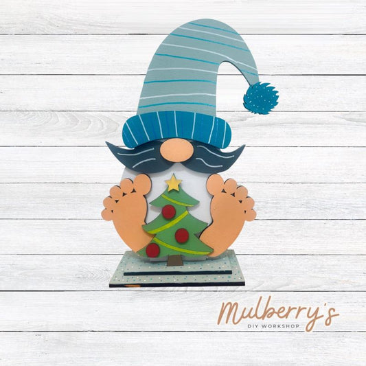 Our cute little interchangeable gnome sitter is a must! He measures 12-inches tall. Swap out his inserts to keep him ready for each holiday and season. Includes interchangeable gnome with Christmas insert.