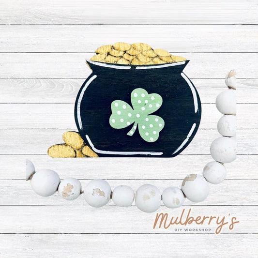 Decorate your home with our Pot of Gold insert. Our inserts may be displayed solo or with our interchangeable gnome, which is sold separately.