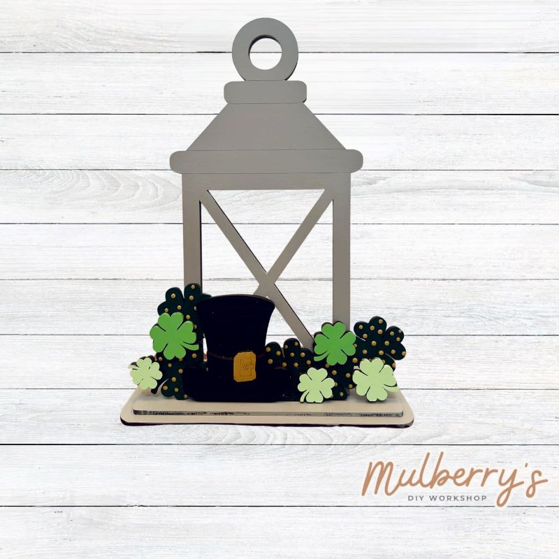 We love our interchangeable lantern! It's approximately 11" tall and can display your favorite seasonal/holiday insert. This set includes the interchangeable lantern and the st. patty insert.