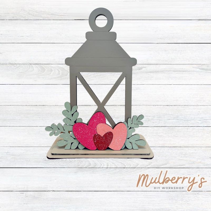 We love our interchangeable lantern! It's approximately 11" tall and can display your favorite seasonal/holiday insert. This set includes the interchangeable lantern and the valentine insert.