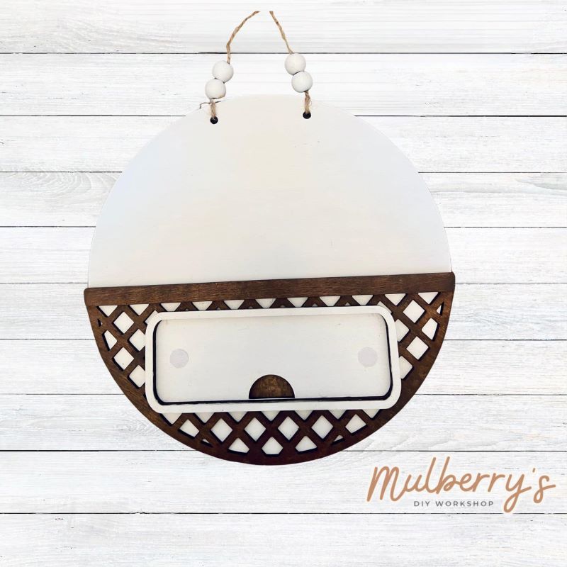 Our Lattice Round Door Hanger is 10.5-inches in diameter. We offer a variety of interchangeable inserts to decorate for each season and holiday.