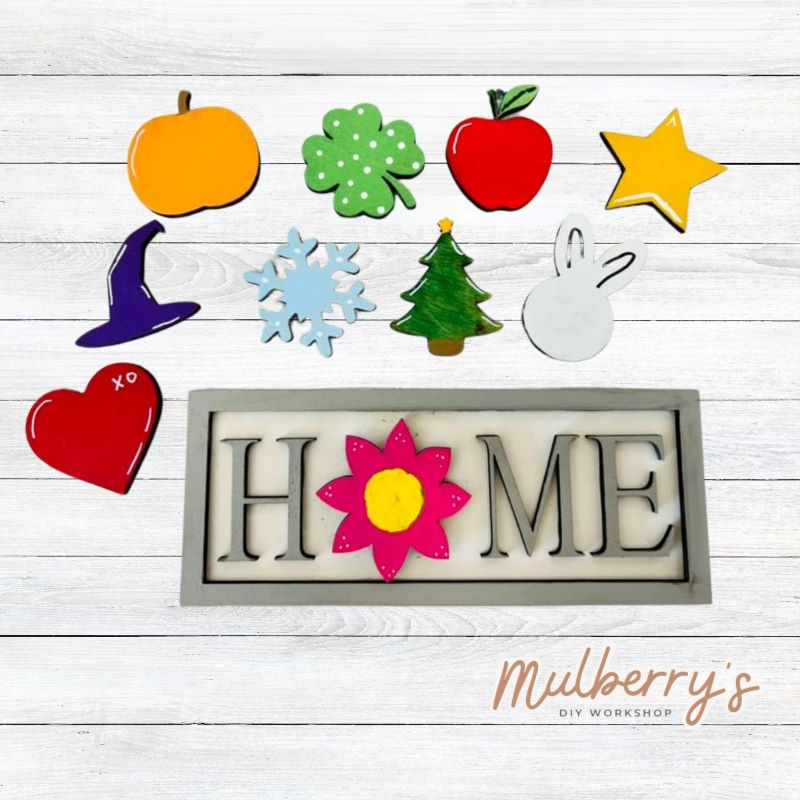 Our interchangeable mini home sign is approximately 3.5" tall by 7" wide. Perfect to display on your tiered tray! Includes base and 10 inserts.