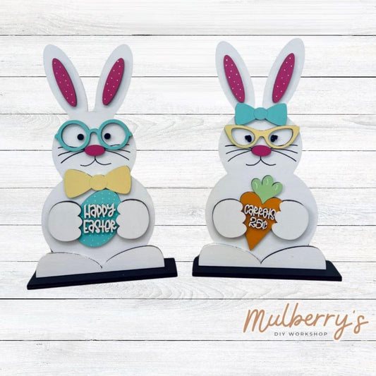 Our stand-up bunny shelf sitters make the perfect basket stuffers! Approximately 12" tall. Stand is included.