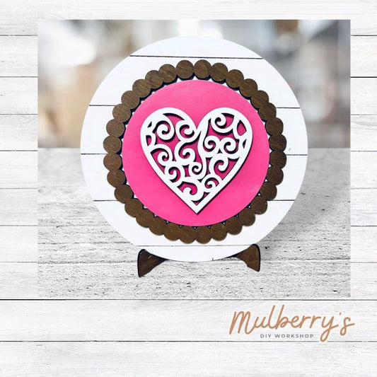 We love our large interchangeable plate with stand! It's approximately 11.5-inches is diameter and can display your favorite seasonal/holiday insert. This set includes the large interchangeable plate with stand and the heart lace insert.