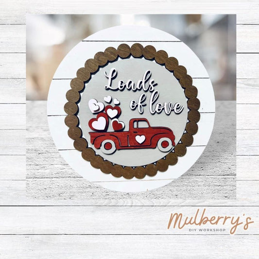 We love our large interchangeable plate with stand! It's approximately 11.5-inches is diameter and can display your favorite seasonal/holiday insert. This set includes the large interchangeable plate with stand and the loads of love insert.