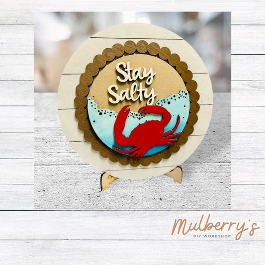 We love our large interchangeable plate with stand! It's approximately 11.5-inches is diameter and can display your favorite seasonal/holiday insert. This set includes the large interchangeable plate with stand and the stay salty insert.