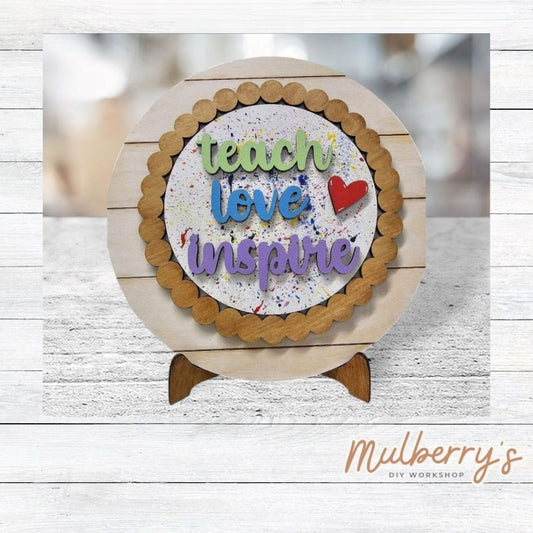 We love our large interchangeable plate with stand! It's approximately 11.5-inches is diameter and can display your favorite seasonal/holiday insert. This set includes the large interchangeable plate with stand and the teach love inspire insert.