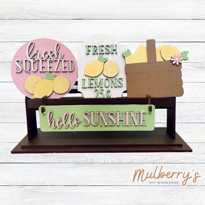 It doesn't get any cuter than our little rustic crate! It's a perfect add on accessory to your décor. It's approximately 13" long.  Includes: Crate and Lemon Inserts. Lemon inserts include Fresh Squeezed sign, Fresh Lemons sign, Lemon Basket, and Hello Sunshine banner.