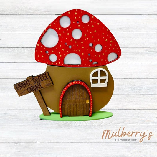 Our little mushroom hut is so adorable! Approximately 7.5" tall by 5.5" wide.