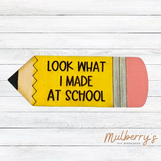 Display your child's artwork with our "Look What I Made At School" pencil magnet!