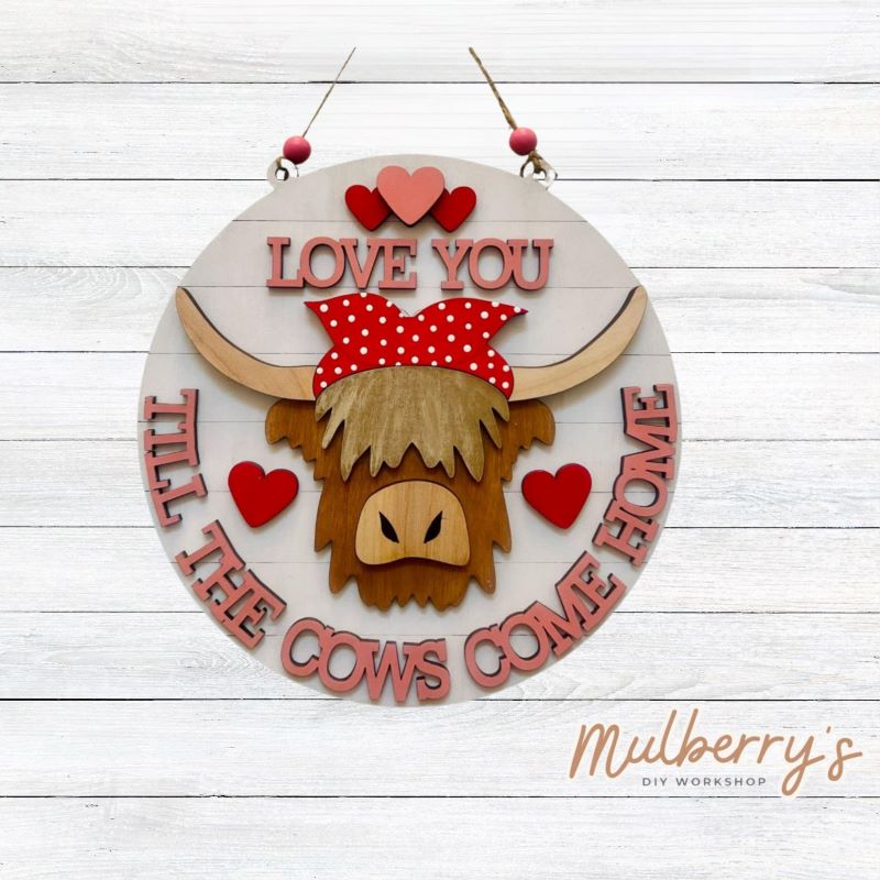 Our Love You Highland Cow mini door hanger is mootastic! Approximately 10.5" in diameter.