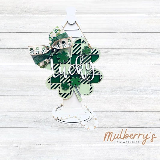 Our lucky shamrock mini door hanger is 10.5" in diameter.