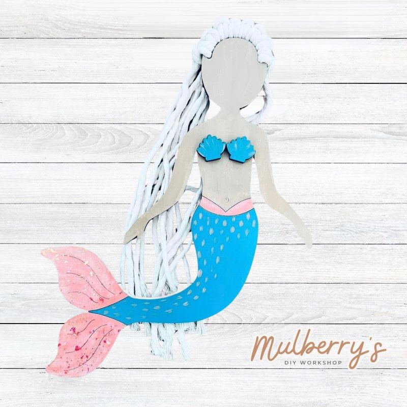 Your child will love our macrame mermaid! Approximately 9" tall.