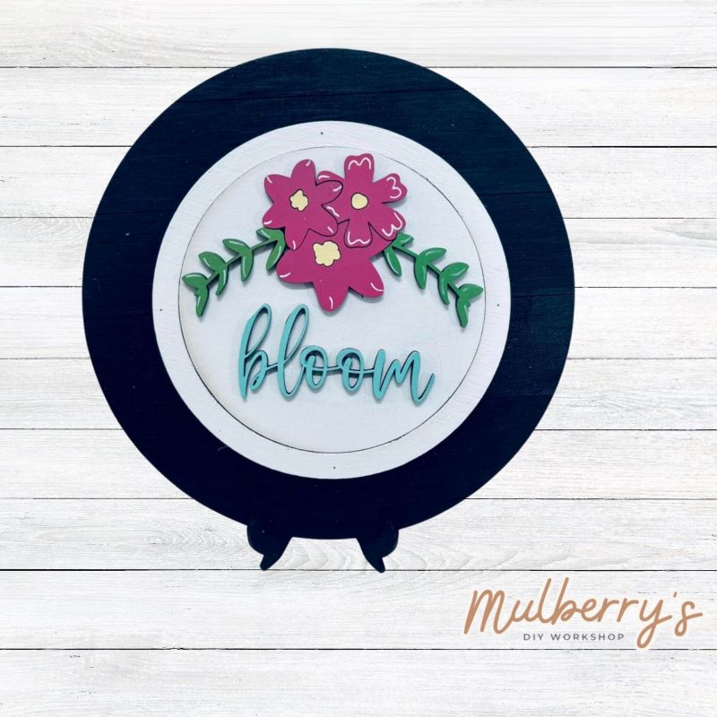 We love our mini interchangeable plate with stand! It's approximately 8-inches is diameter and can display your favorite seasonal/holiday insert. This set includes mini interchangeable plate with stand and bloom insert.