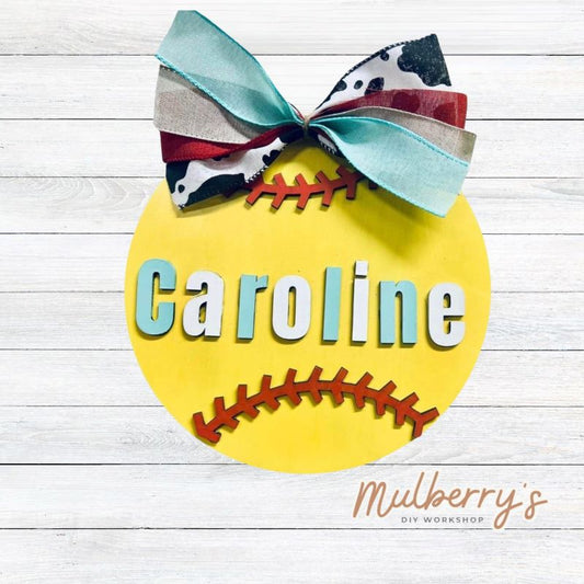 Personalize your own softball with our 9.5" mini door hanger!