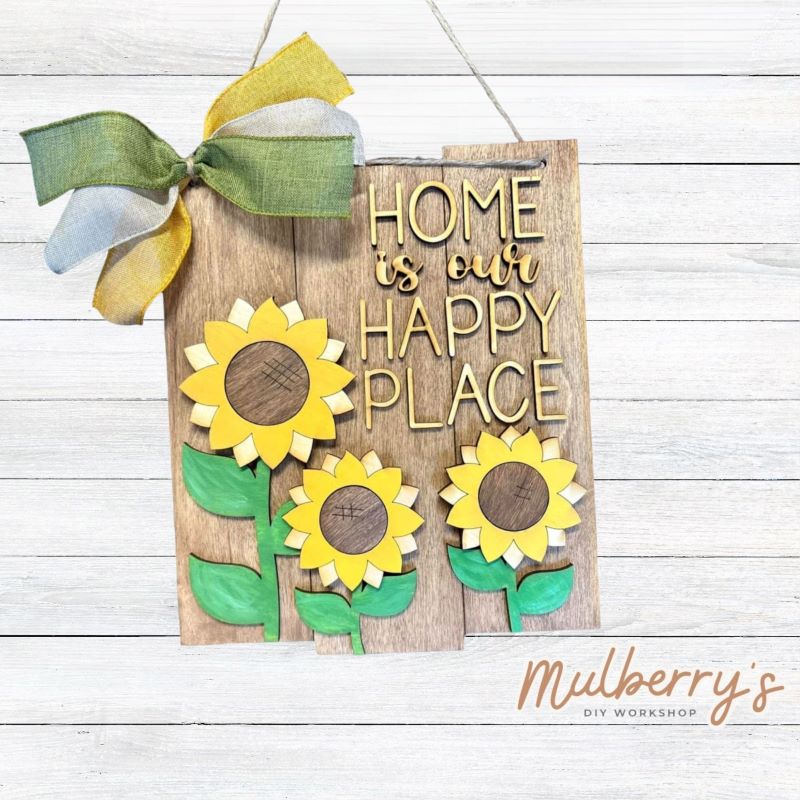 Our sunflower mini door hanger is perfect for anytime of the year! Approximately 12" tall.