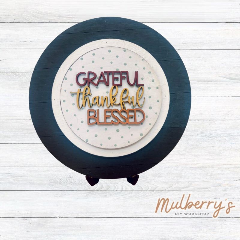 We love our mini interchangeable plate with stand! It's approximately 8-inches is diameter and can display your favorite seasonal/holiday insert. This set includes mini interchangeable plate with stand and grateful thankful and blessed insert.