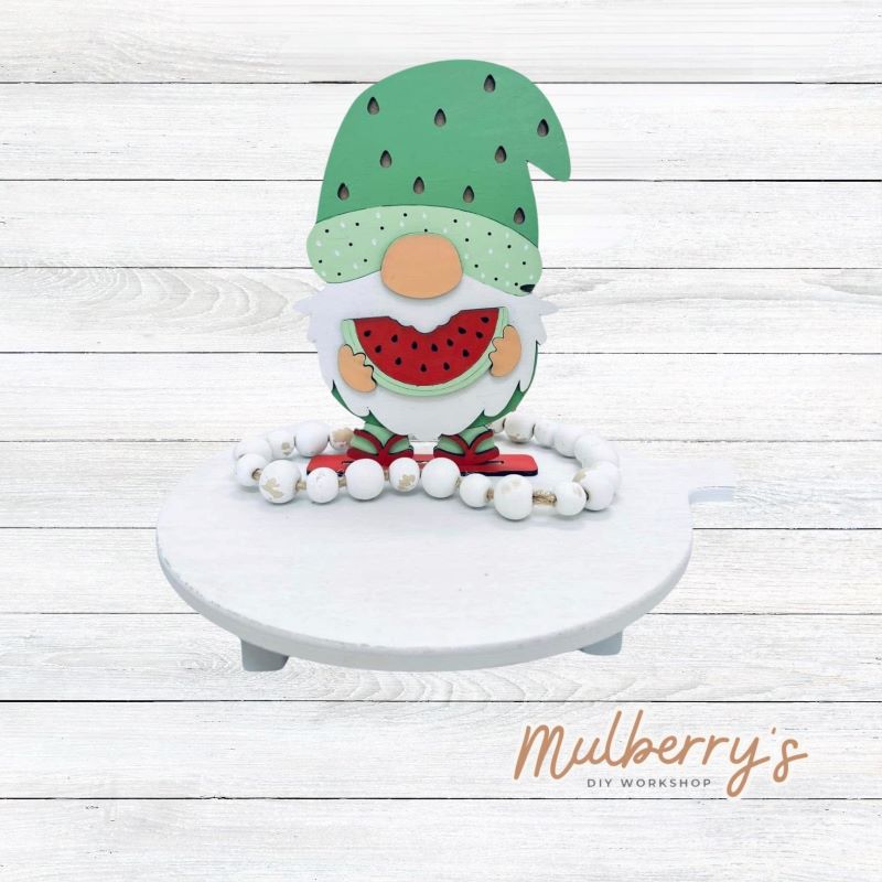 Our watermelon mini gnome is too sweet! Approximately 8" tall. Stand is included.