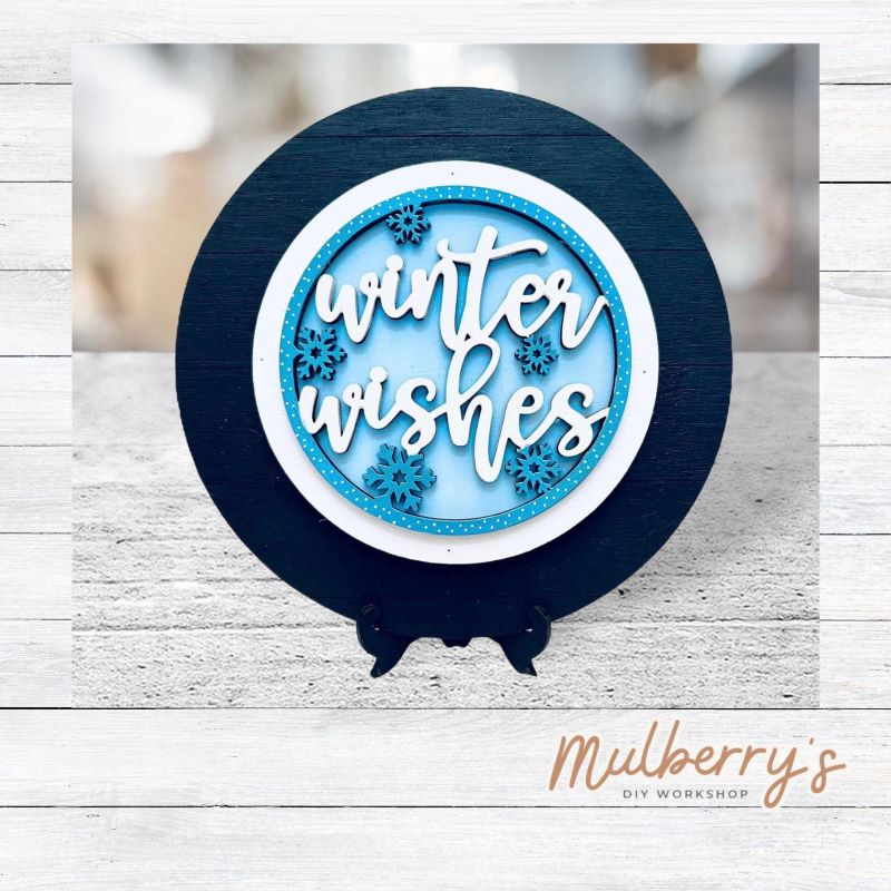 We love our mini interchangeable plate with stand! It's approximately 8-inches is diameter and can display your favorite seasonal/holiday insert. This set includes mini interchangeable plate with stand and winter wishes insert.