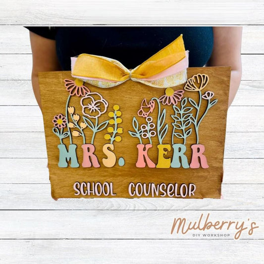 Our personalized name sign is perfect for your classroom! Approximately 15" wide by 11" tall. Optional stand is available.