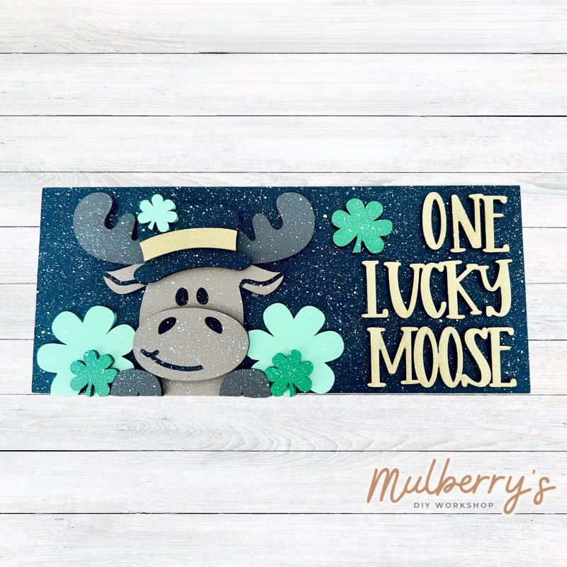 Are you one lucky moose? Come decorate this adorable mini sign for your home! Approximately 4" tall by 9.5" wide.