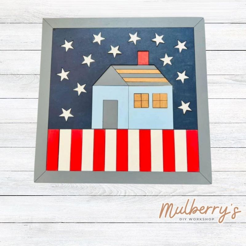 Show your American spirit with our Patriotic House barn quilt! Approximately 10.5" tall by 10.5" wide. Optional stand is available.