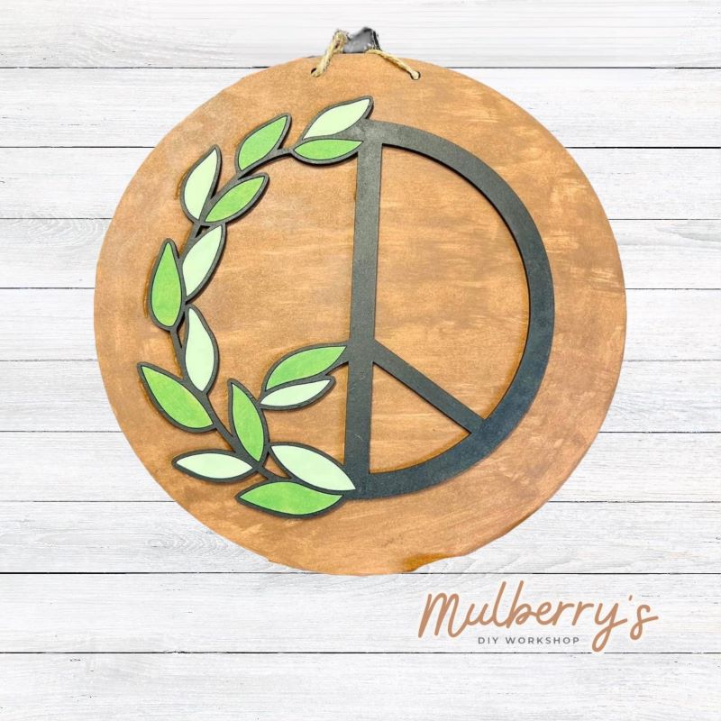 Set the vibe with our 9.5" Peace Mini Door Hanger.