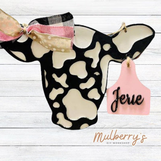 Does it get any cuter than this mini cow door hanger with personalized ear tag!?  Measures roughly 14-inches tall.