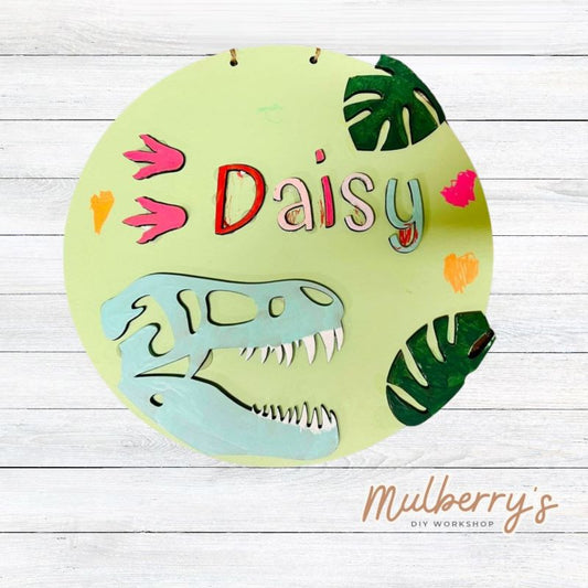 Our mini 9.5" door hanger with a dinosaur and is a popular project for kids! This design can be personalized with a name in either print or cursive.