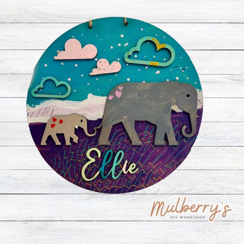 Our mini 9.5" door hanger with a elephant and is a popular project for kids! This design can be personalized with a name in either print or cursive.